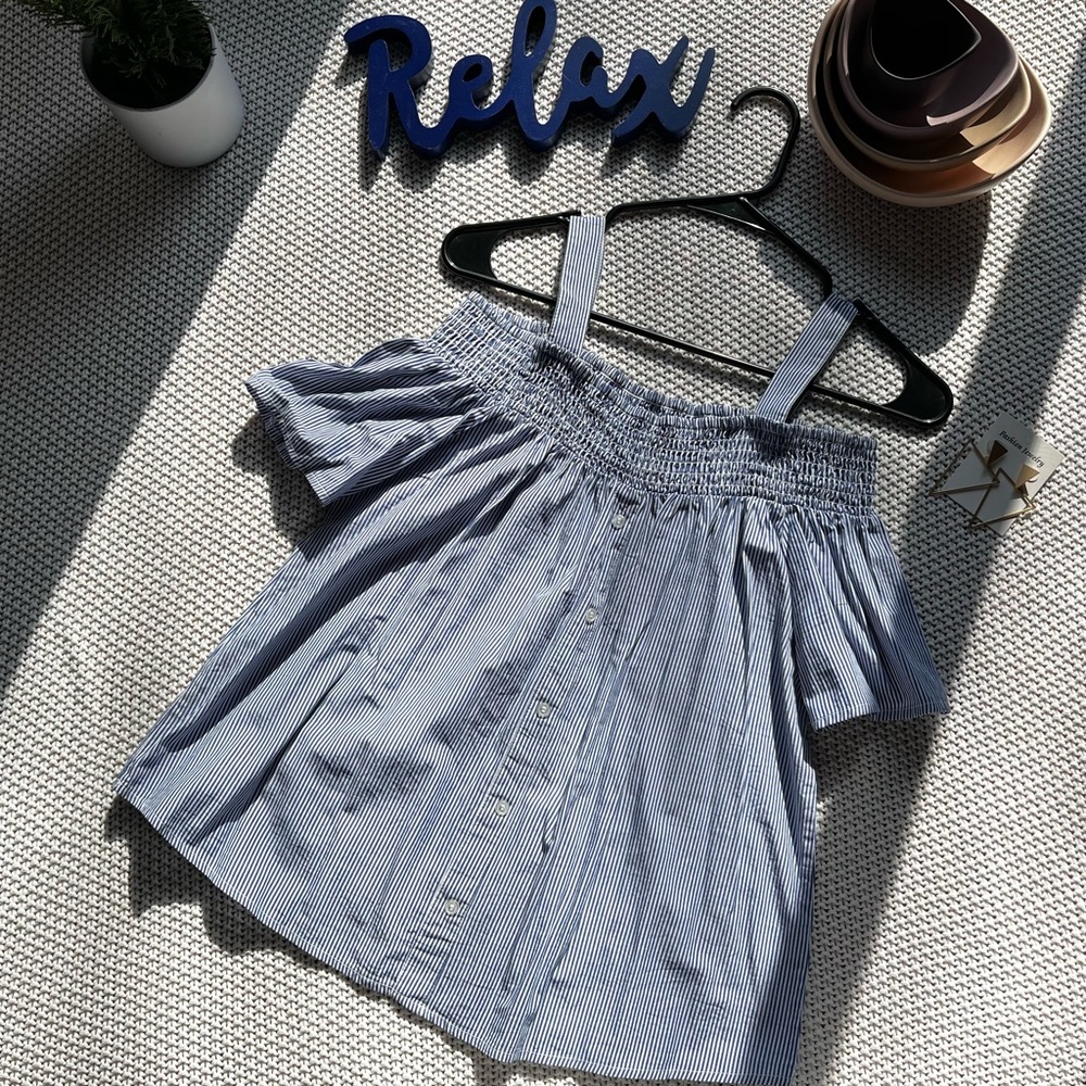 Cute, off the shoulder, blue striped blouse.